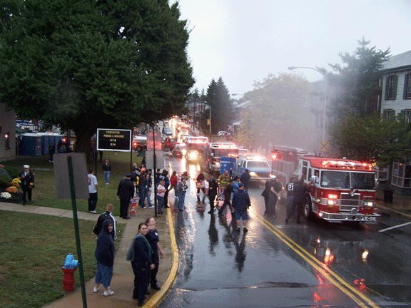 The parade of apparatus leaving the 2005 Housing.