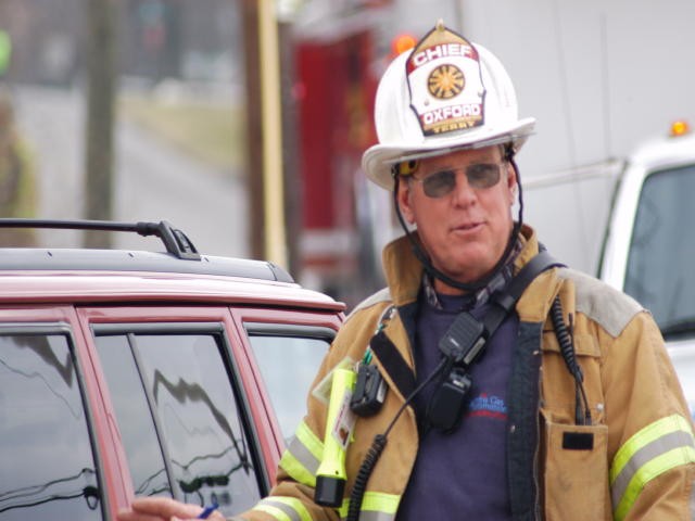 Fire Chief Rich Terry at a mobile home fire on West Ridge Road.