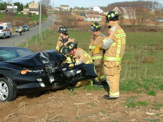 Crews operating at a Frog Hollow Road crash.