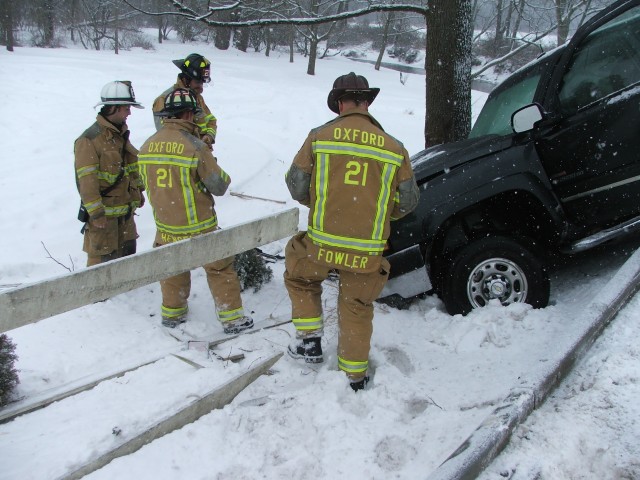 Rescue crew on a snowy crash on Route 896.