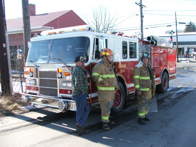 Steve Gray, Gerry Davis, and Alan Hastings at a house fire on Mount Pleasant Avenue.