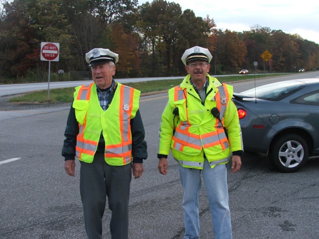 President Emeritus Willard Ayers and Fire Policeman Myron Wagner at a crash on Route 1.