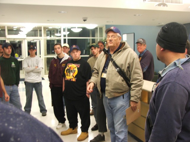 Gerry Davis leads a tour of the new dorms at Lincoln University.