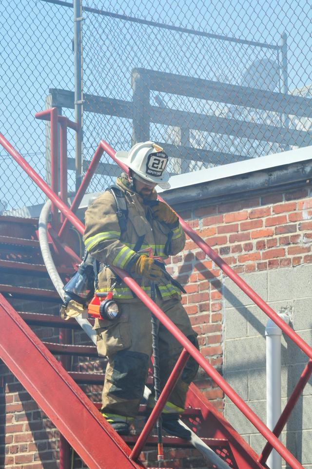 Deputy Chief Bob Prettyman coming off of the roof.