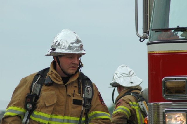 Firefighter Mike Hallman wrapped and ready for a live burn.