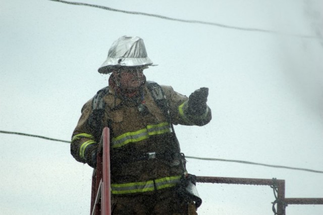 Deputy Chief Chris Obenchain observing from the upper patio level.