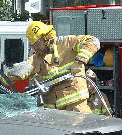 Firefighter Alan Hastings taking an &quot;A&quot; post at a crash.