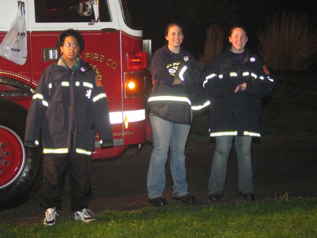 EMS crew of Linda Dutton, Samantha Jackson, and Shannon Glenn at a house fire on Hickory Hill Road.