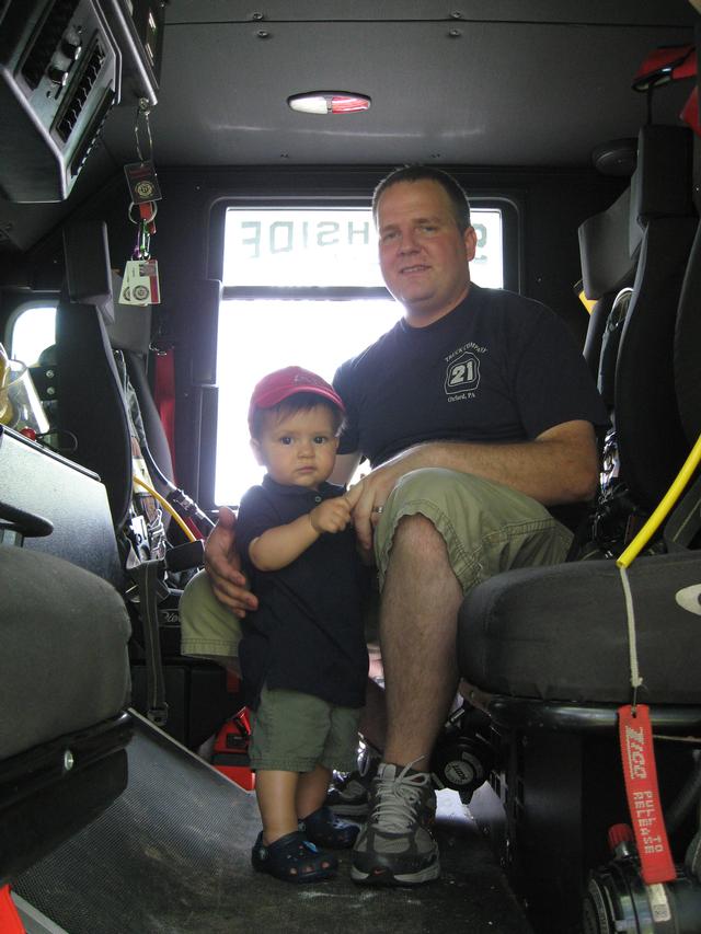 Firefighter Mike Hallman with his son.