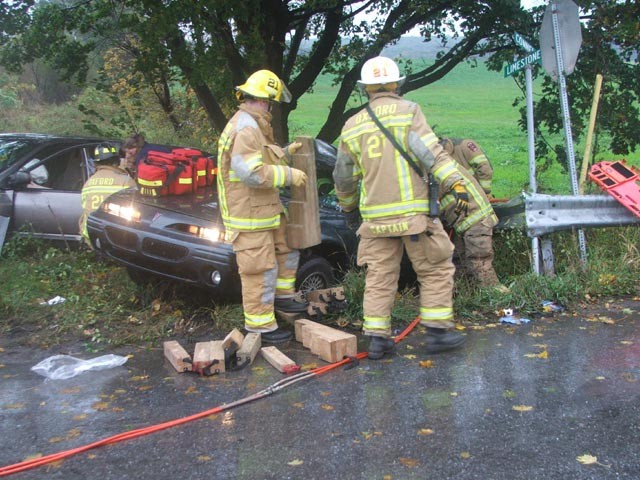 Crews work to extricate 2 from a Route 10 crash.