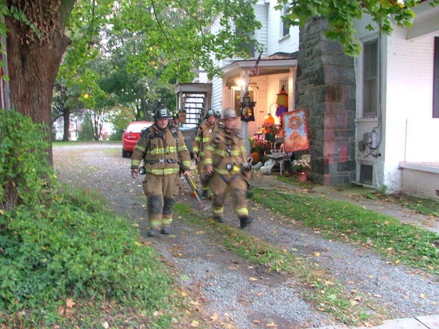 The crew Engine 1 leaving an electrical fire on Market Street.