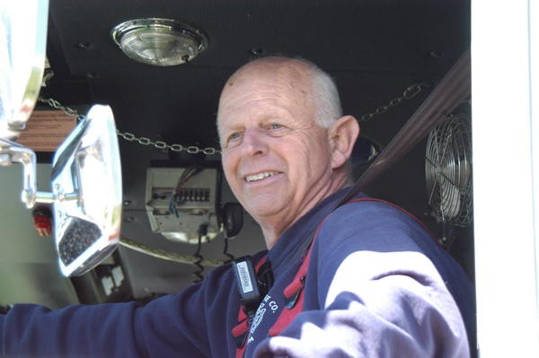 Dave Vining driving Engine 2 at a West Grove house fire.