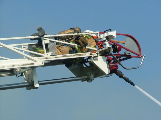 Deputy Chief Obenchain operating the ladder pipe.