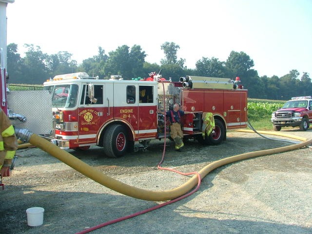 Dave Vining pumping Engine 4 on a Forge Road barn fire.