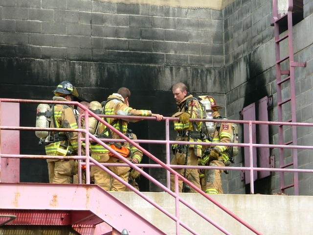 Crews catching a breather after a live burn.