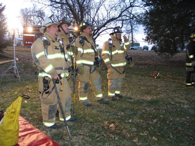 (L-R) Sam Terry, Morgan Derr, Bill Gray, and Dave Vining standing by as the RIT at a West Grove house fire.