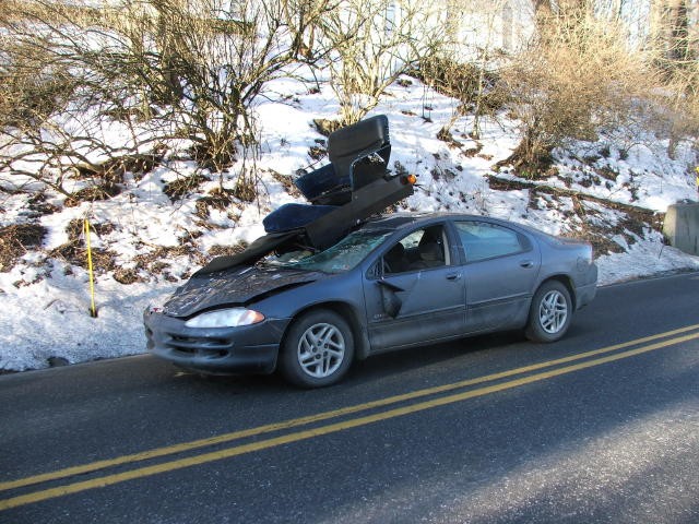 An Amish buggy into a windshield on Route 472.