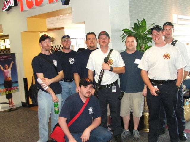 Morgan Derr, Shaun Burke, Sam Terry, Chris Obenchain, and Terry Rivera with Captain Scott Hardin and his crew at the Charlotte Airport.