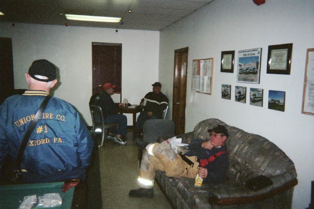 Dave Vining, BJ Meadowcroft, Sam Terry, and Rich Terry in the lounge at Station 43 in Coatesville on a Engine Transfer.