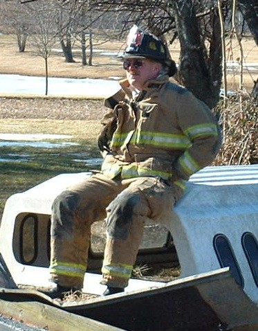 Firefighter Mike Evosirch on a Rising Sun building fire.