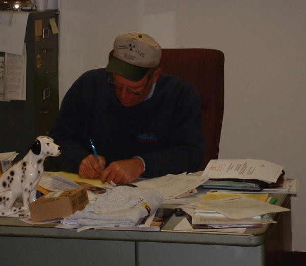 Fire Chief Rich Terry doing some paperwork in his office.