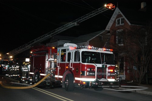 Engine and Truck in service on a Market Street house fire.