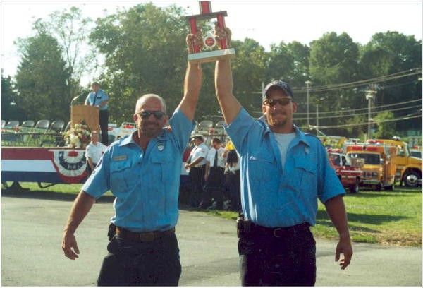 Father and Son, Steve and Bill Gray celebrating a parade victory!