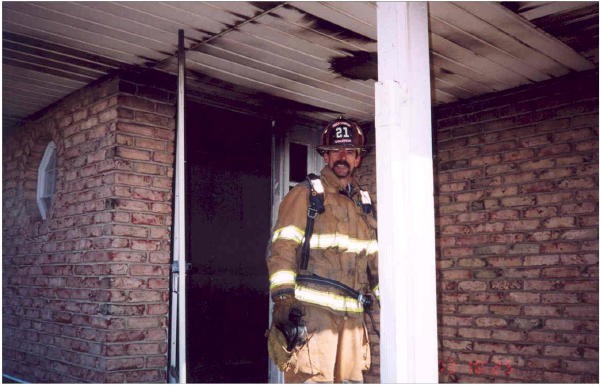 Firefighter Mike Nelson at a Reedville Road house fire.