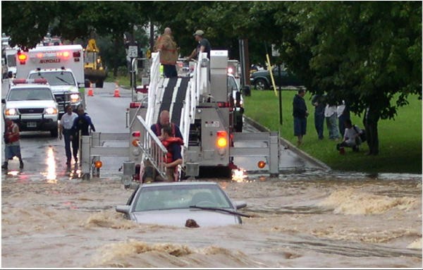 Brian Kelley and Chris Obenchain making a rescue from Ladder 21 in flooding conditions in Kennett Square.