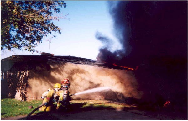 The &quot;Blitz&quot; line in service on the rear of the house fire on Reedville Road.