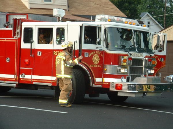 Lieutenant Bud Charlton boarding Rescue 21 during a training exercise.