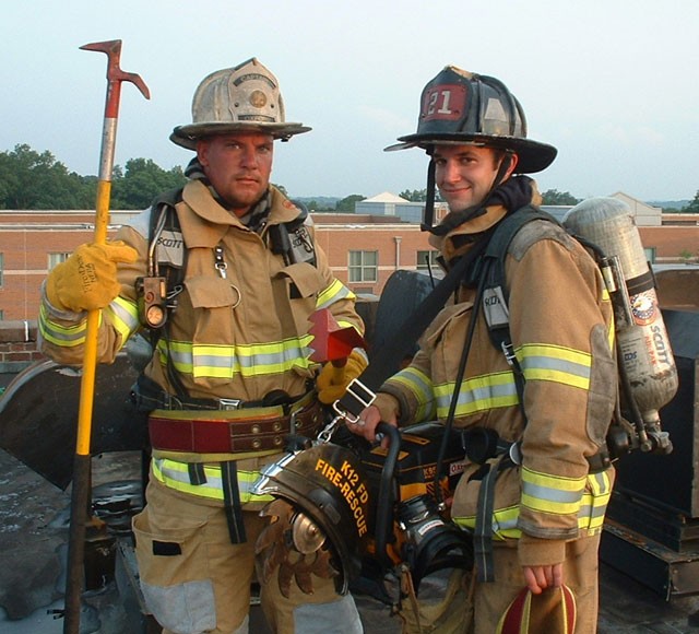 Bill Gray and Brian Kelley on the roof at Lincoln.