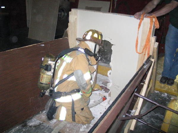 Firefighter confidence course in the Tanker Bay.