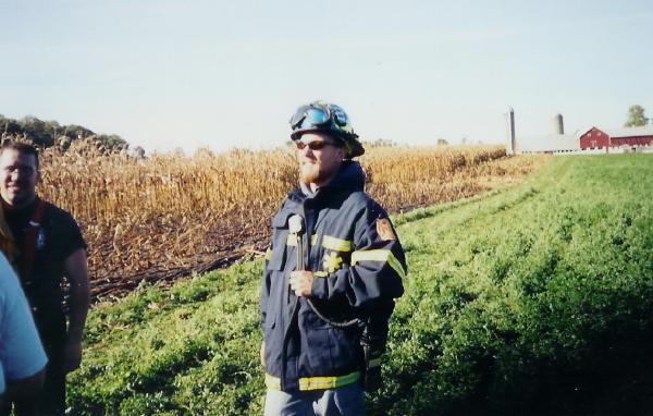 Captain Bill Gray running command in his &quot;PPE&quot; at a brush fire.