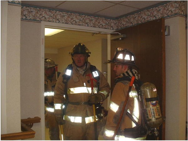 Captain Bill Gray, Gerry Davis, and Brian Kelley at a drill at the Ware.