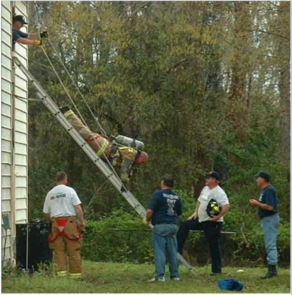 Captain Bill Gray performing a ladder bailout at the Orlando Fire Conference.